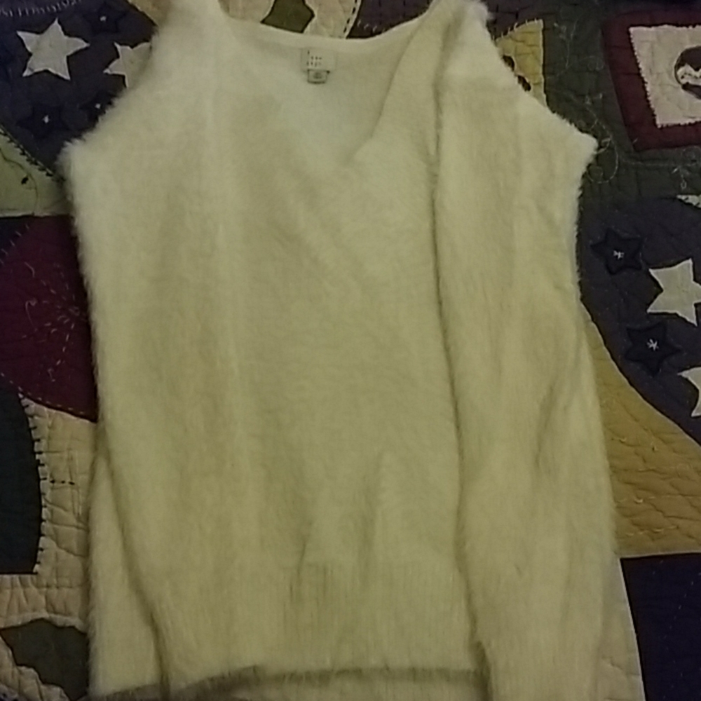 A white V-Neck Sweater